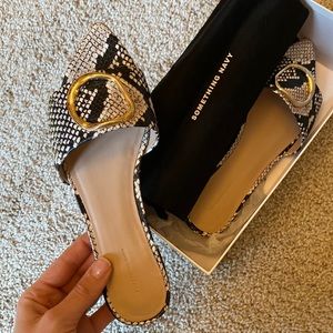 Something navy snake skin and gold hardware sandals